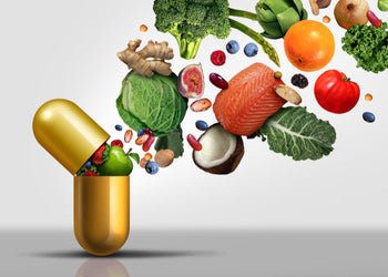 Vitamin capsule with fruits and veggies flying out